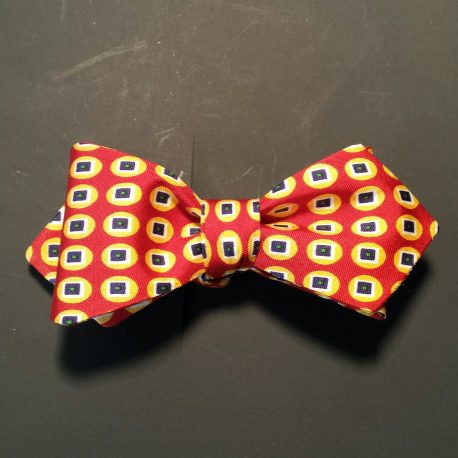 tied orange navy dot dp